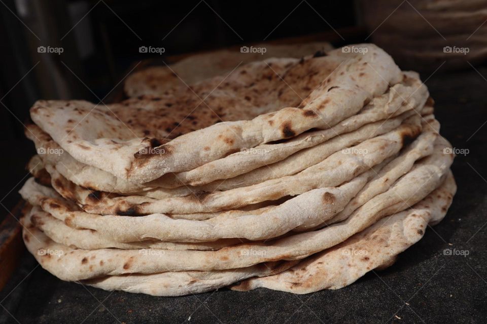 Fresh and hot pita bread pile