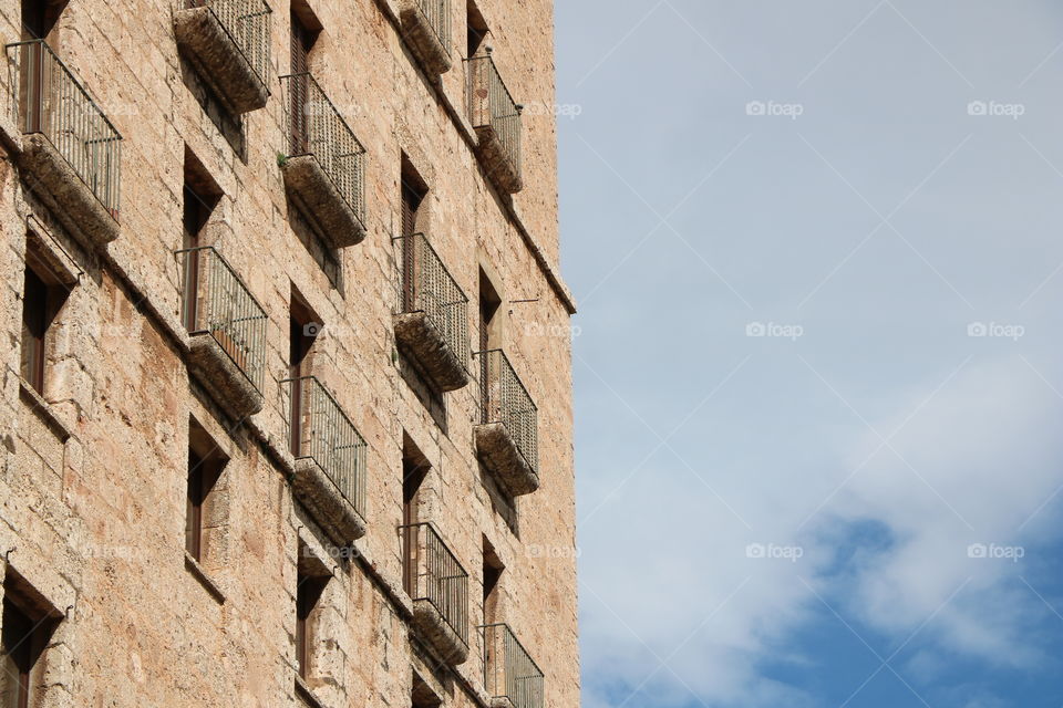 Old building and cloudy sky