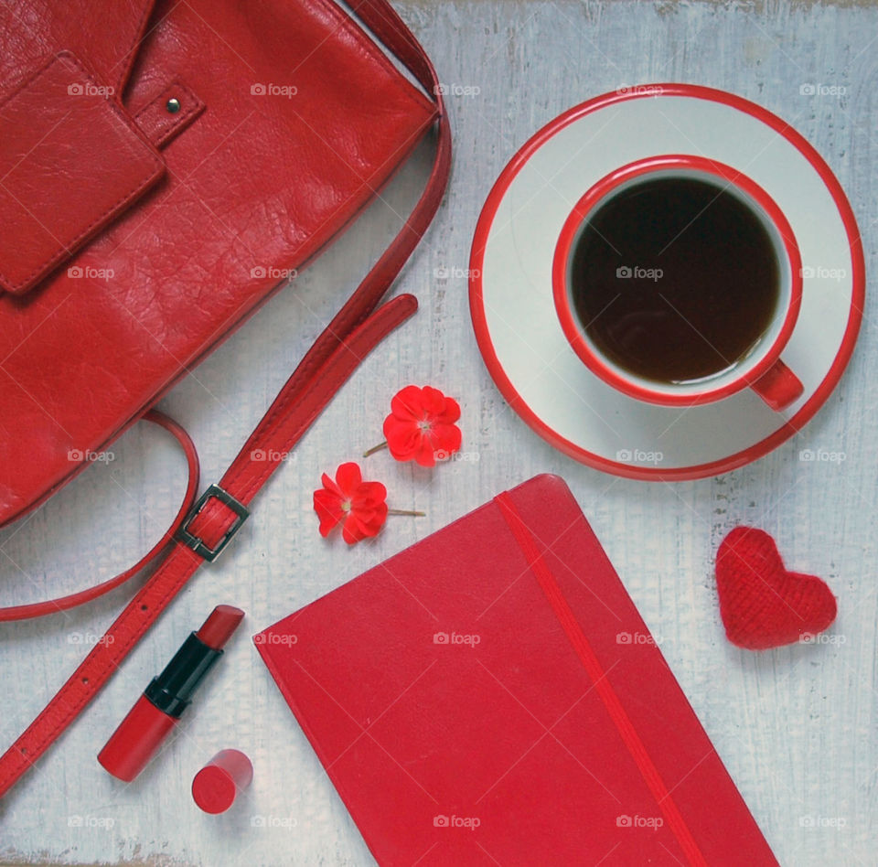 coffee and red things flatlay