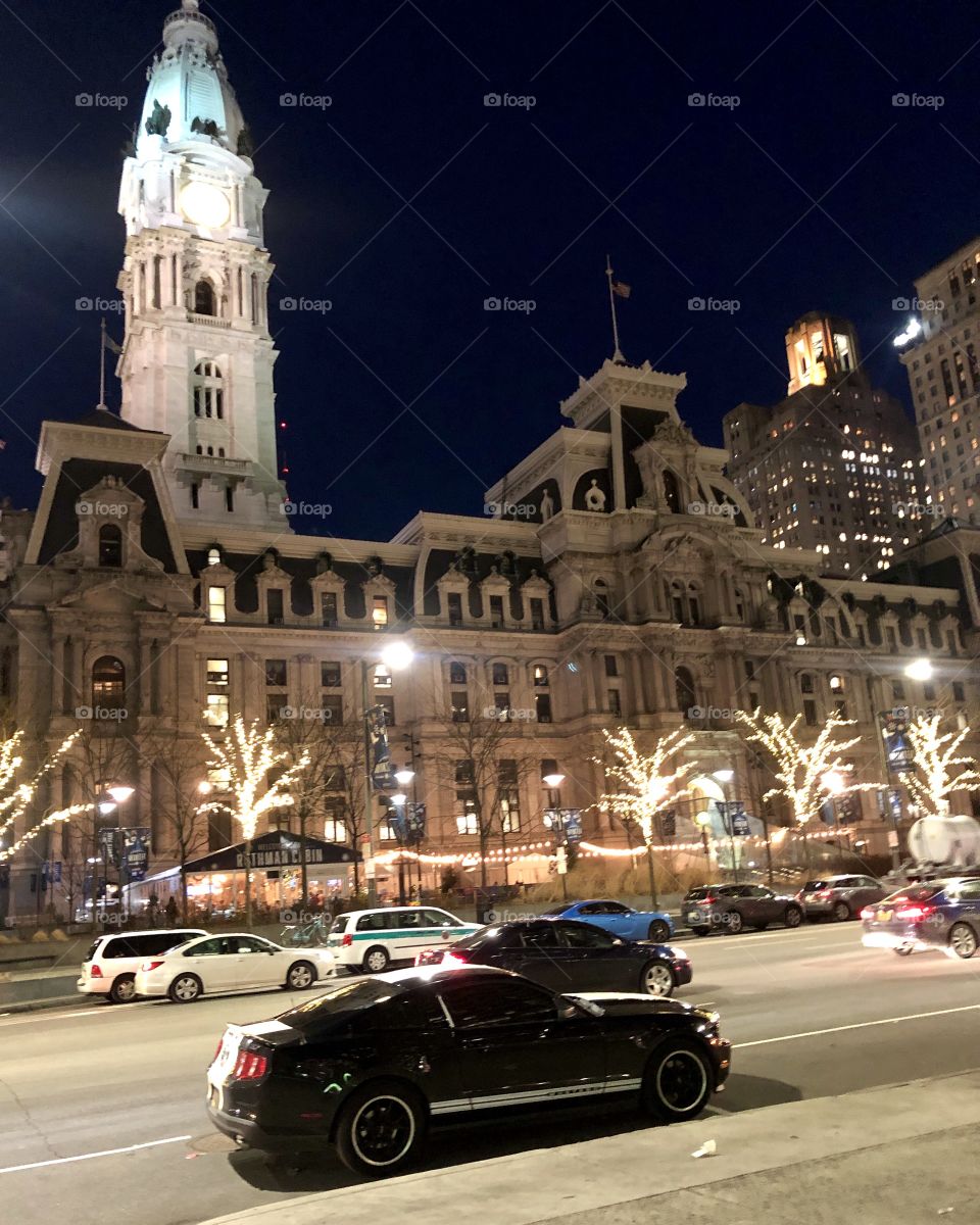 City Hall Philadelphia with festive tree lights at night