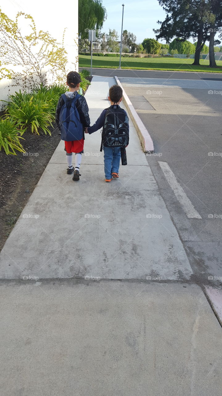 boys walking to school