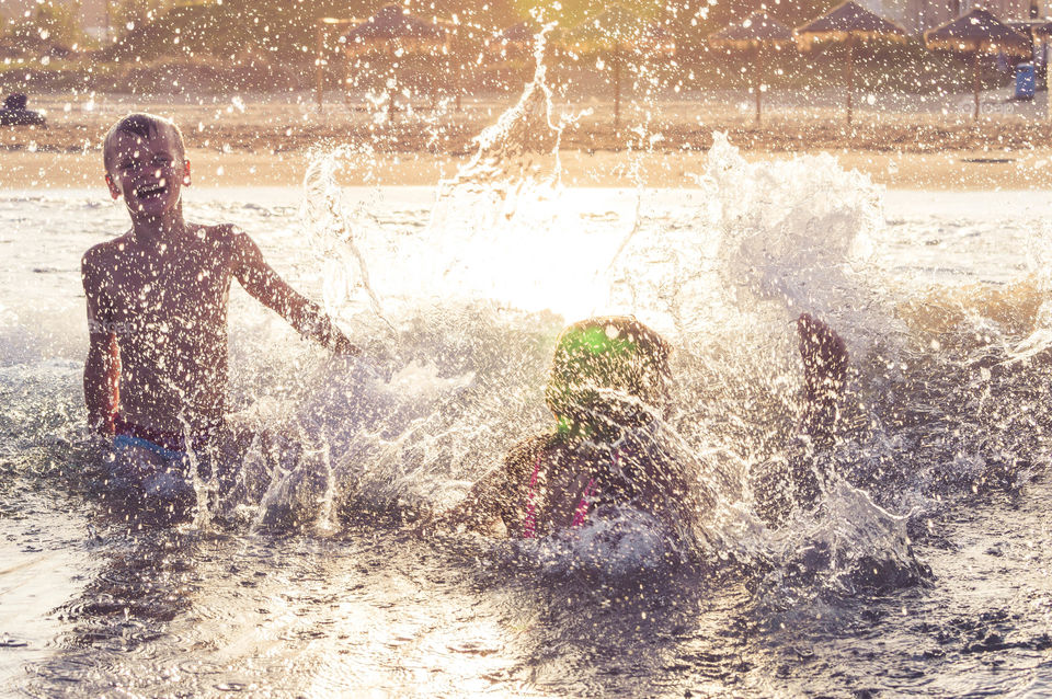 Swimming in the sea with a lot of splashes