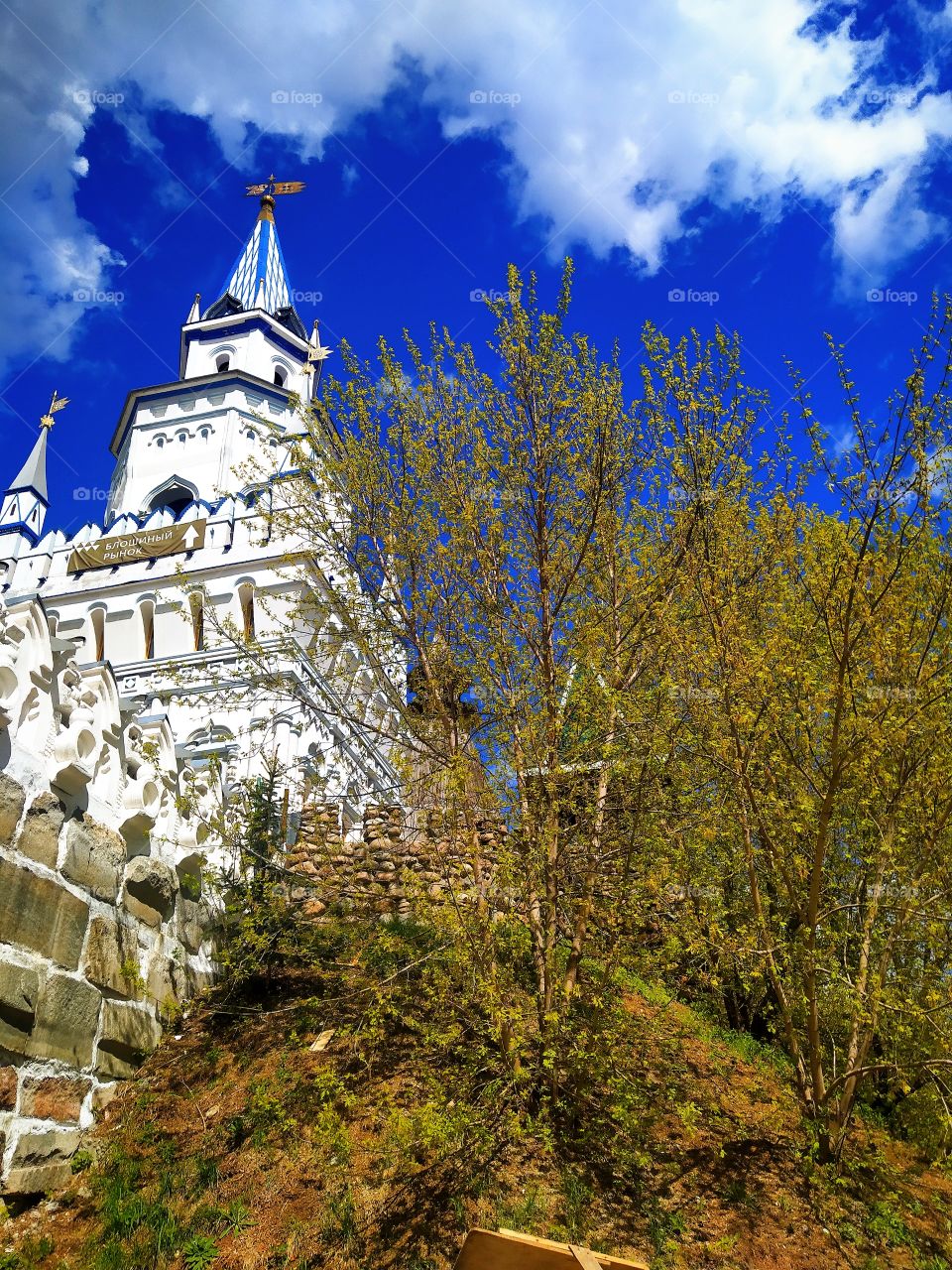 Stone tower among the trees