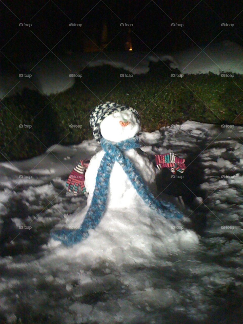 Wilting snowman. Snowman at rest
