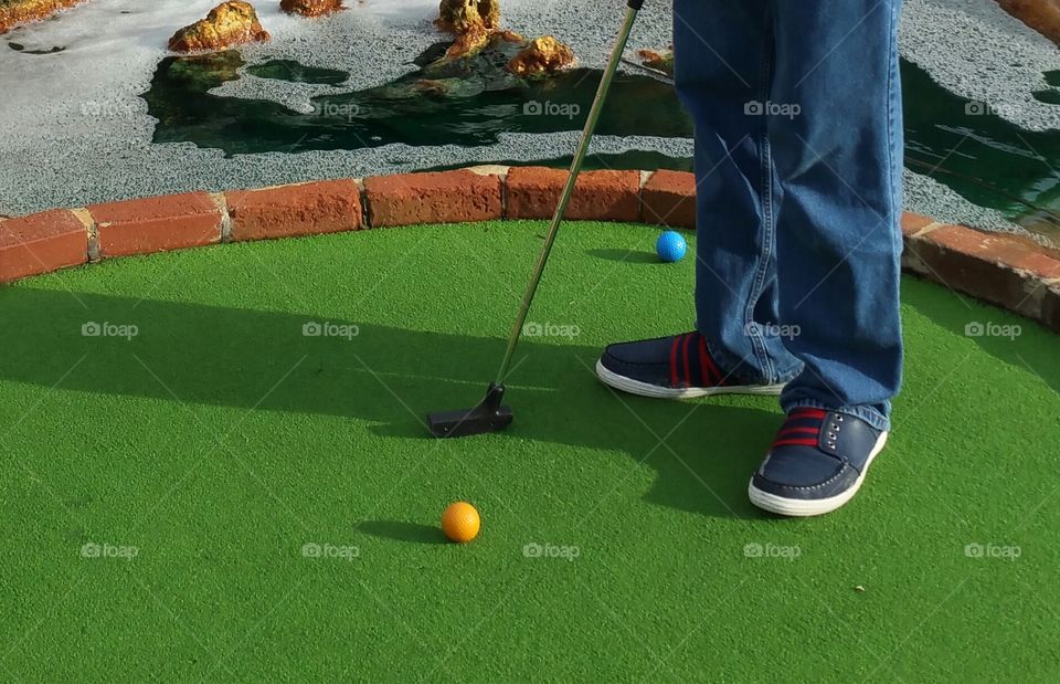 Playing mini golf