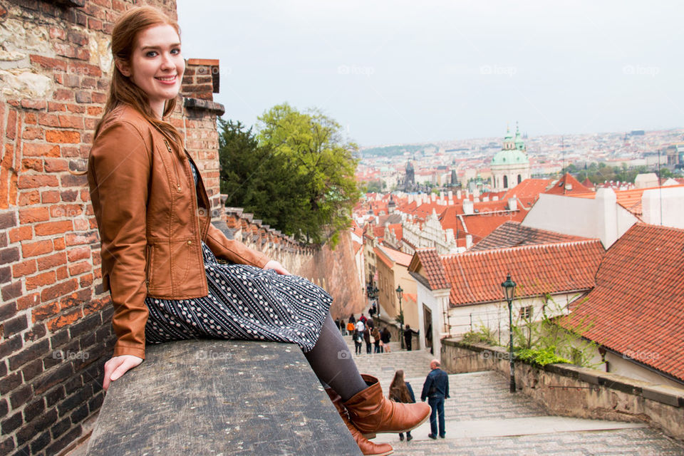 Girl looking out over the city 