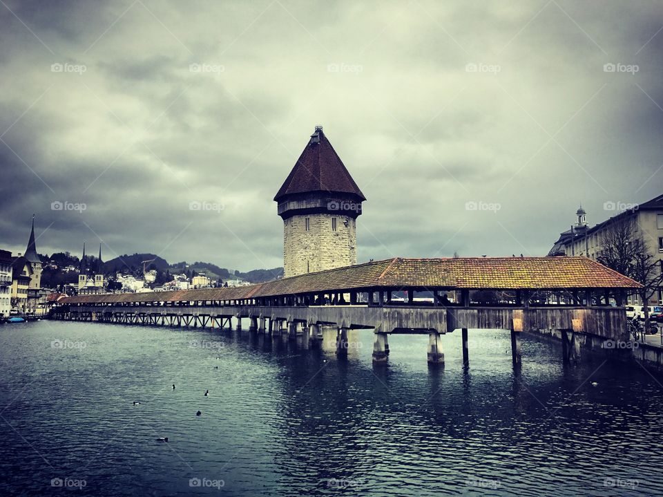 Moody sky and wooden bridge in Luzern Switzerland 