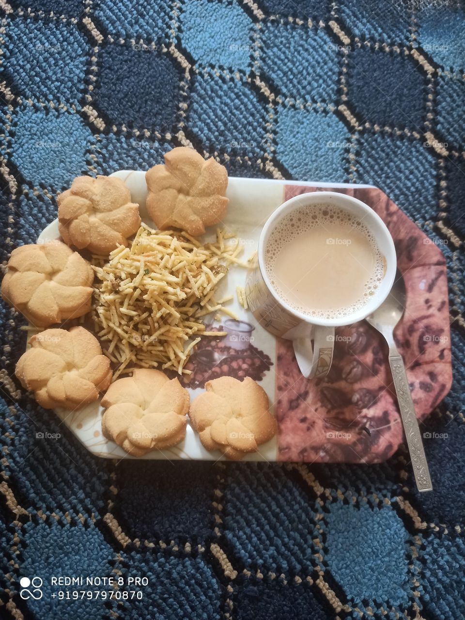 Lipton tea &  snacks  usually beatufied  in taste by local bread called "Bakir Khaani" at 10:30am local time in Kashmir valley ..........