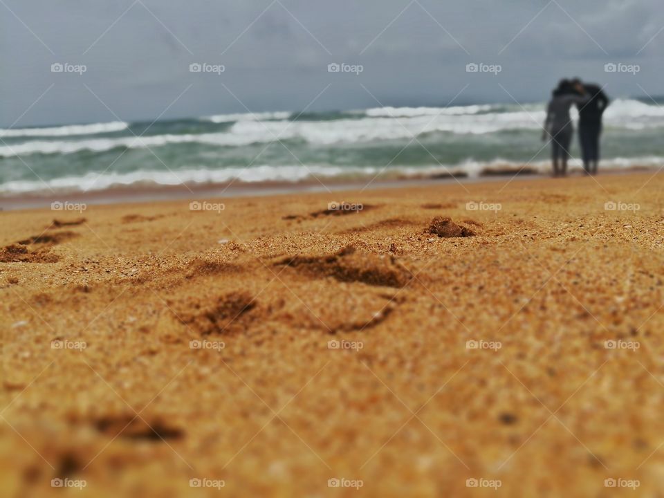 Couple having good time at beach.