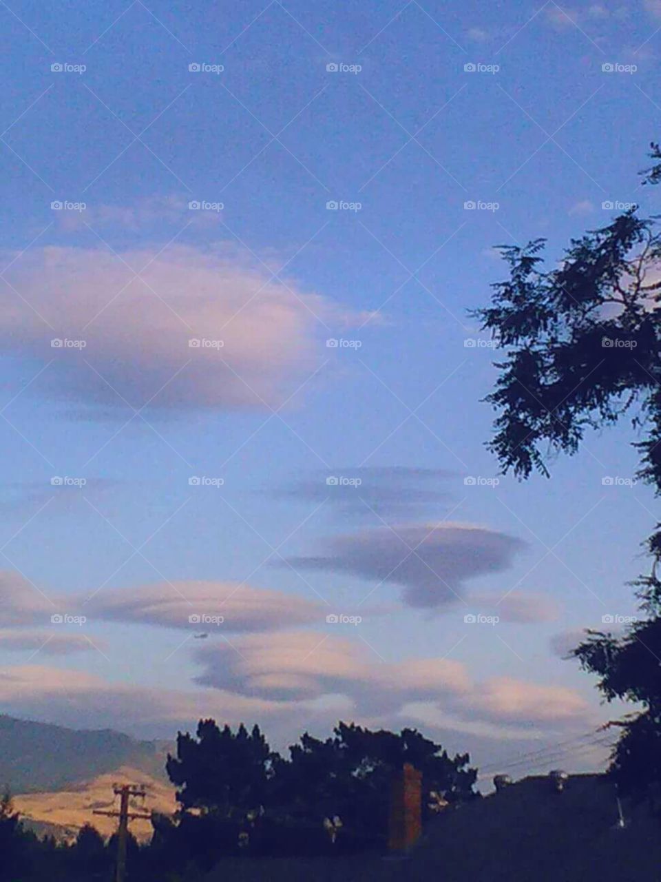 ufo round clouds