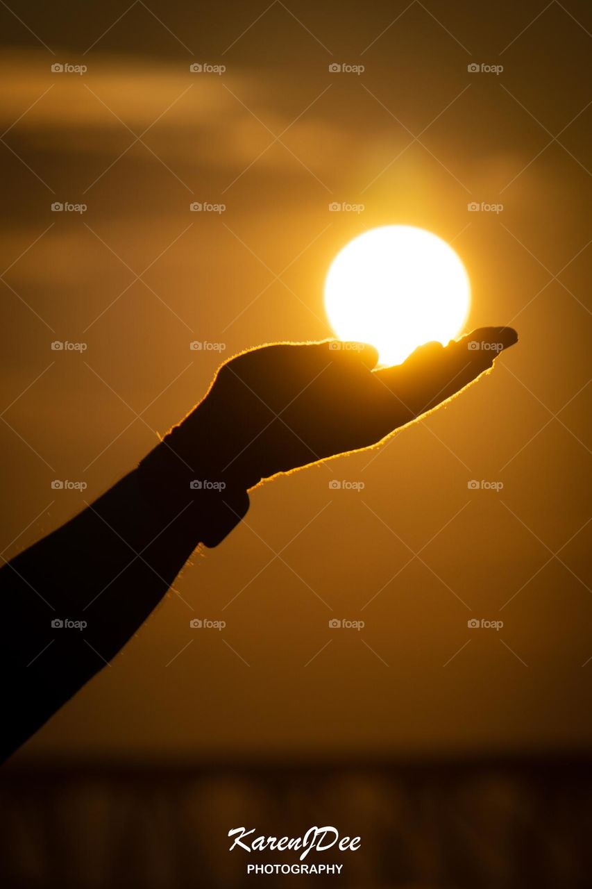 sun in the palm of your hand