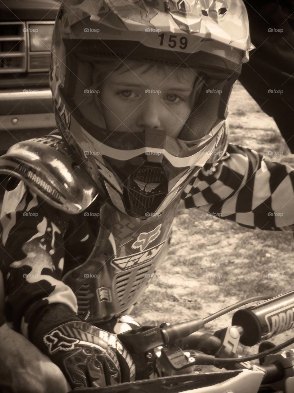 Its Mine. This is my 6 yr old, Ethan Jack, #159. He's been racing dirt bikes since age 2. This is what he calls his "race face." 