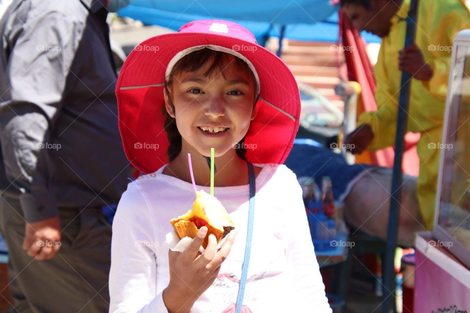 Happy girl with an ice cream