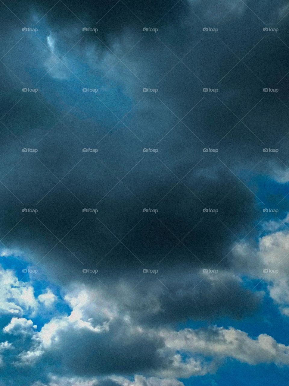 I want to show white clouds and blue sky in this photo.  The sky looks very beautiful with clouds and blue sky.