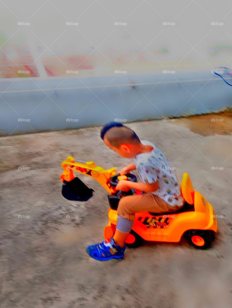 He loves riding his favorite excavator car and run around our home in yangsan South Korea.