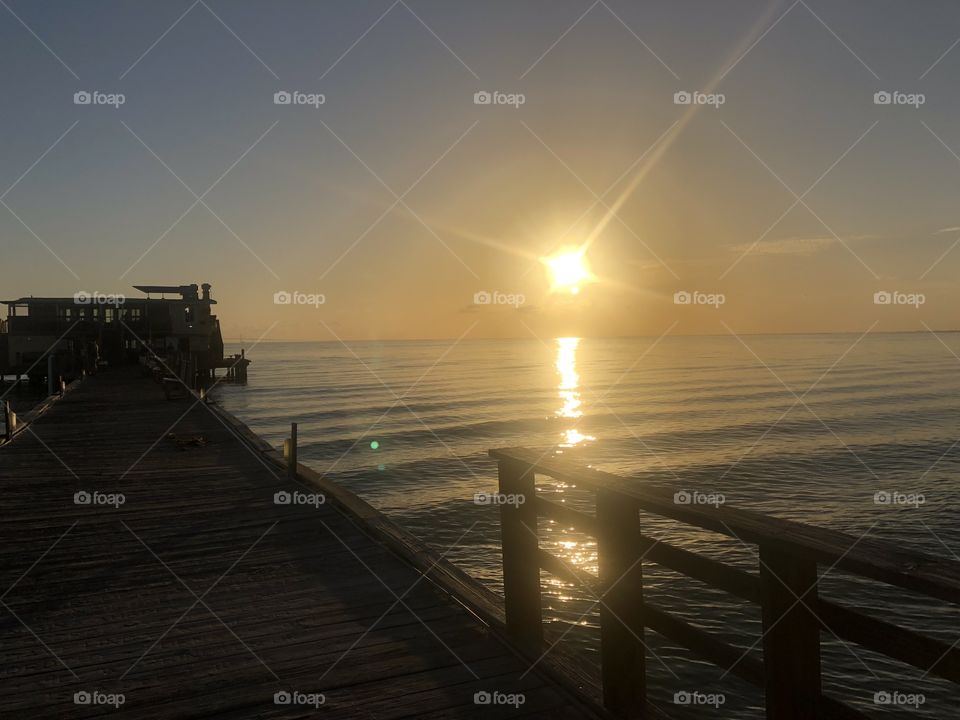 Anna Maria Island Florida sunrise on Rod n Reel Pier. 