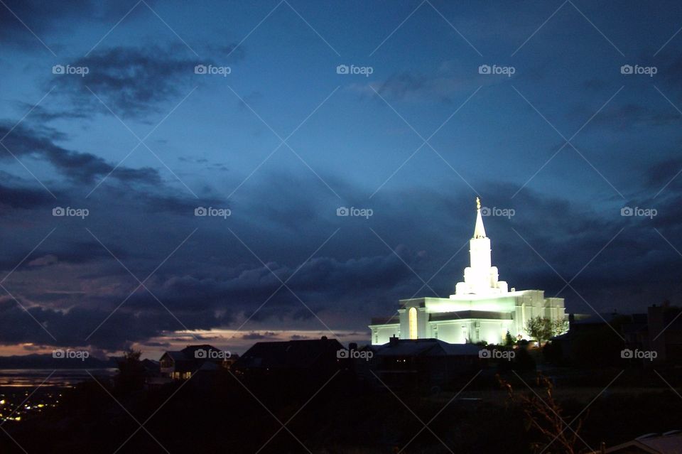 The Bountiful, Utah LDS Temple glowing through an evening storm