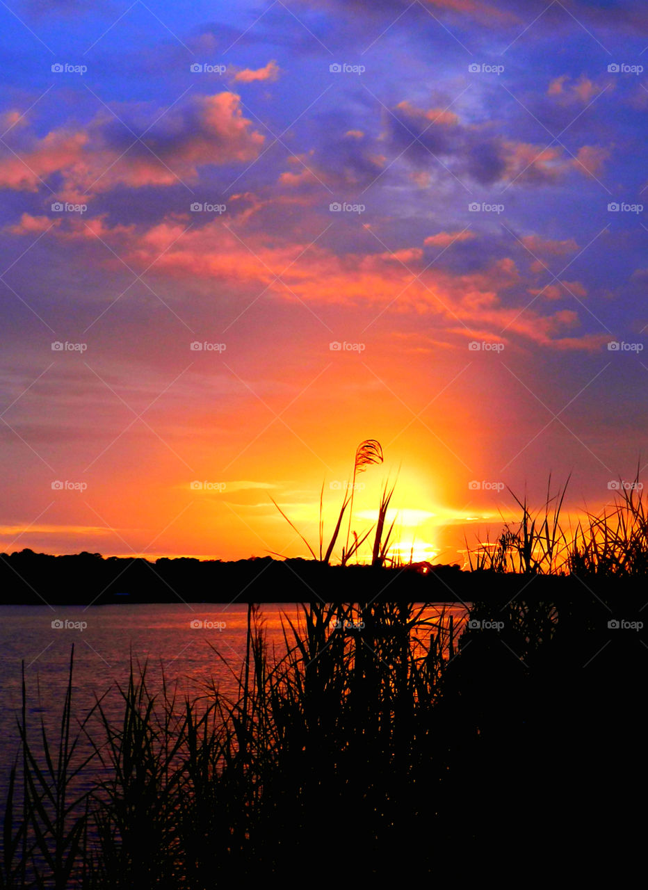 Cascading sunset with a bombardment of radiant colors