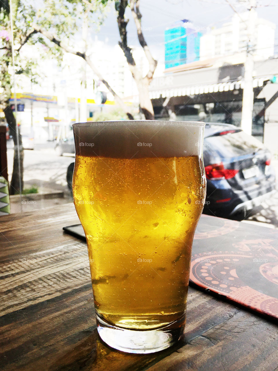 Beer served in a restaurant in São Paulo before the pandemic and before the quarantine period. Happy hour with friends. Food concept. Mexican food concept.