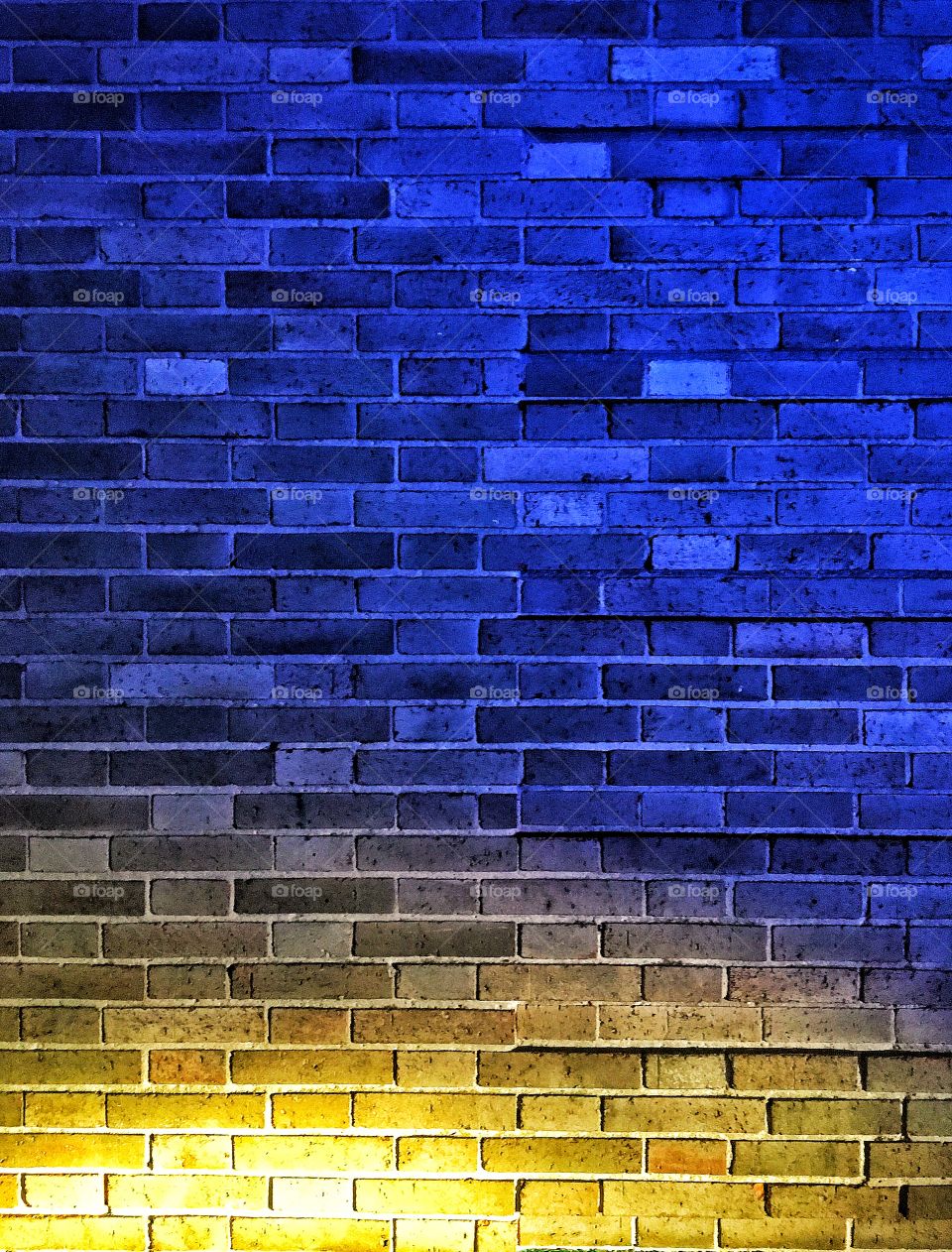 Street lights on a brick wall 