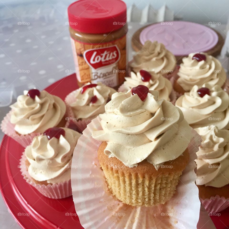 Biscoft Cupcakes with cream cheese frosting and a dazzle of raspberry marmalade. 