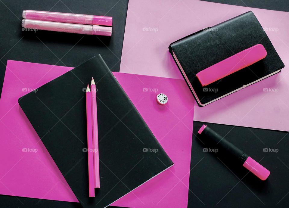 Pink and black stationary flat lay