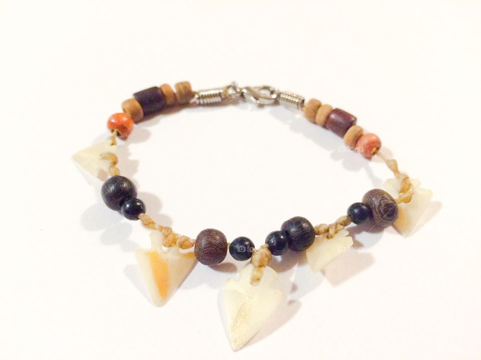 Multi colored bracelet with teeth 