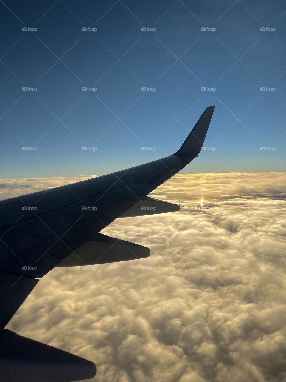 Sunset flying over the clouds on a Southwest Airlines Boeing 737