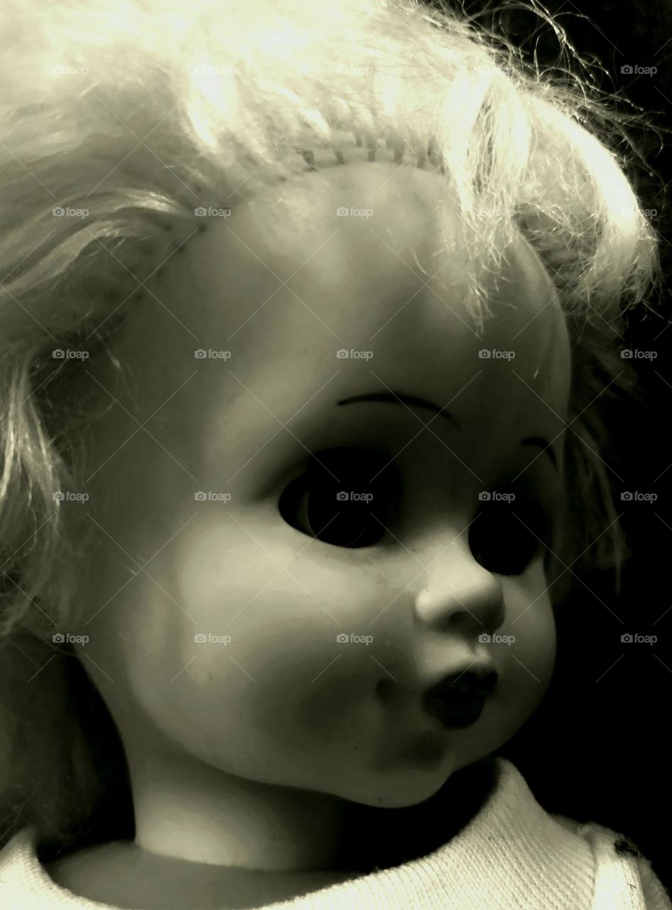 creepy doll face