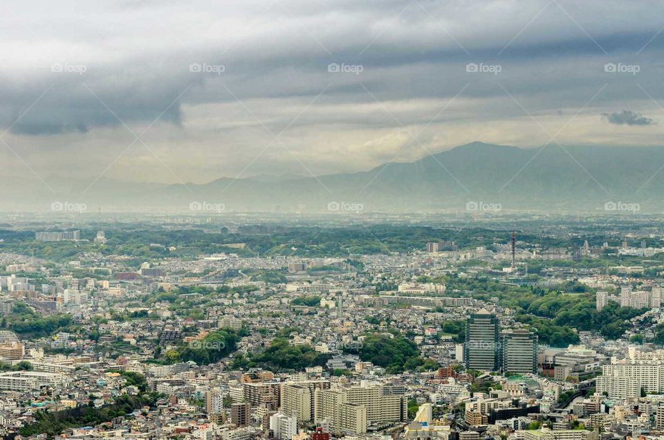 View of Yokohama's cityline from the top of the building called "The Landmark" at Minato Mirai 21 district,  Yokohama,  Japan.
