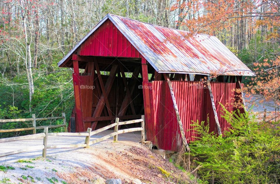 A covered bridge in the woods