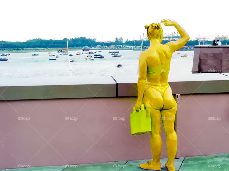 Yellow woman waiting