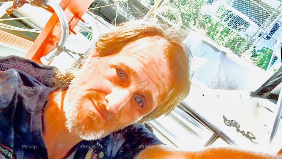 This is “Timothy Trespas“, my partner in life and everything for quite a few years now aboard the „Salvation“, our „28 ft 1969 Luhrs“ cabin cruiser at „Newtown Creek“ by the „Pulaski Bridge“ in LIC, Queens. 2023. Hypnotic Productions