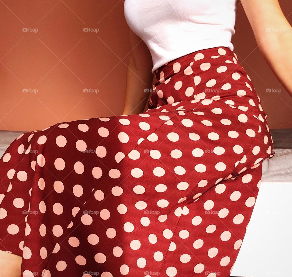 Polka dot skirt /polka dot world /maroon colour polka dot skirt on a woman/posing with clothing /model wearing a polka dot vintage skirt