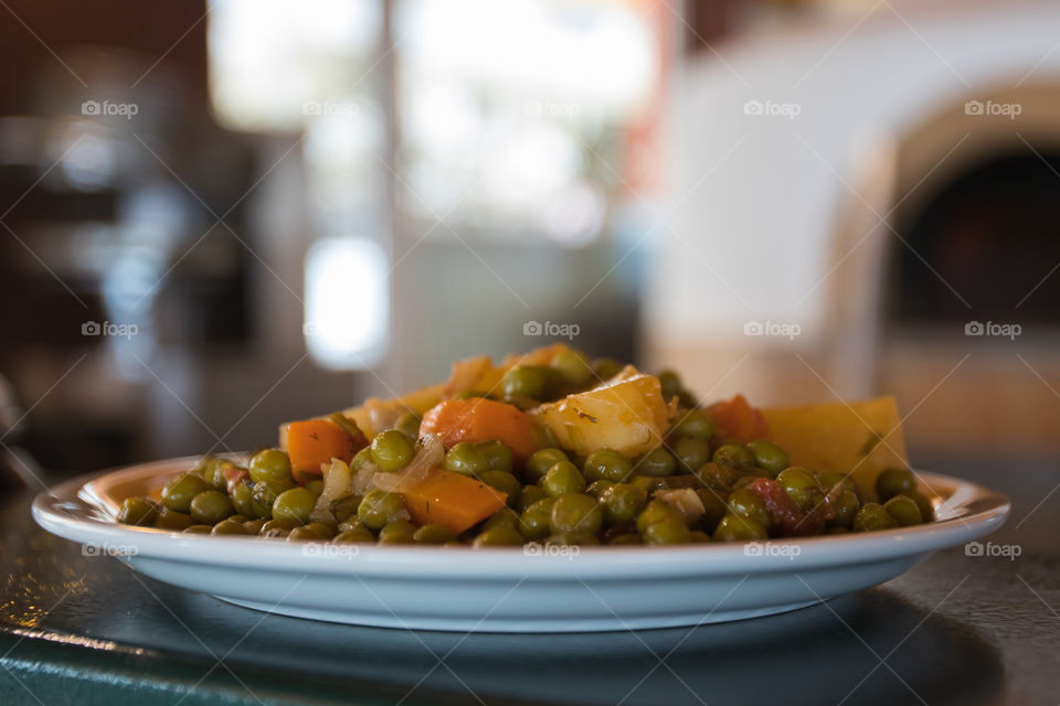 plate of peas in tomato sauce