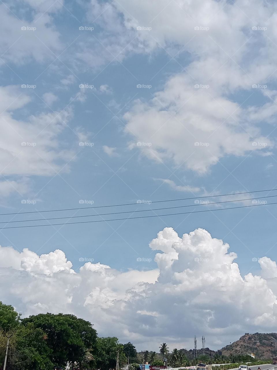 ravarma white clouds blue