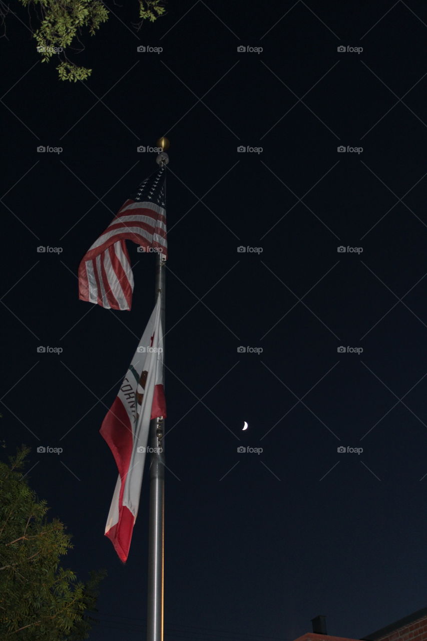 night Flags blowing in the wind