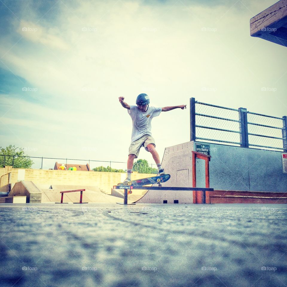 Young skateboarder in local scare park in Gaithersburg, Maryland. Edited. 