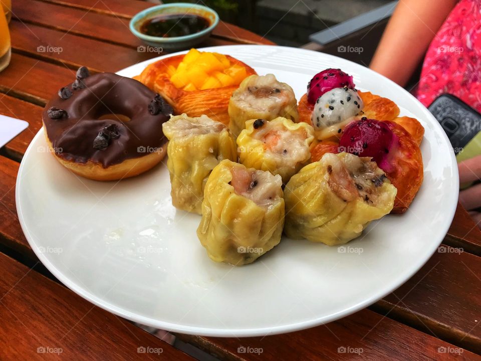 It is a wonderful time of the year indeed....!  East meets West... donut meets shumai meets danish pastry 
Breakfast on Hainan Island