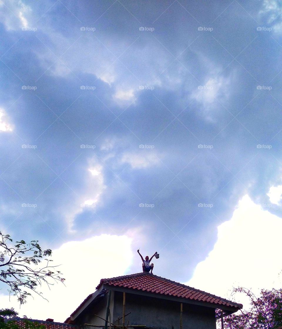 The person above is precarious