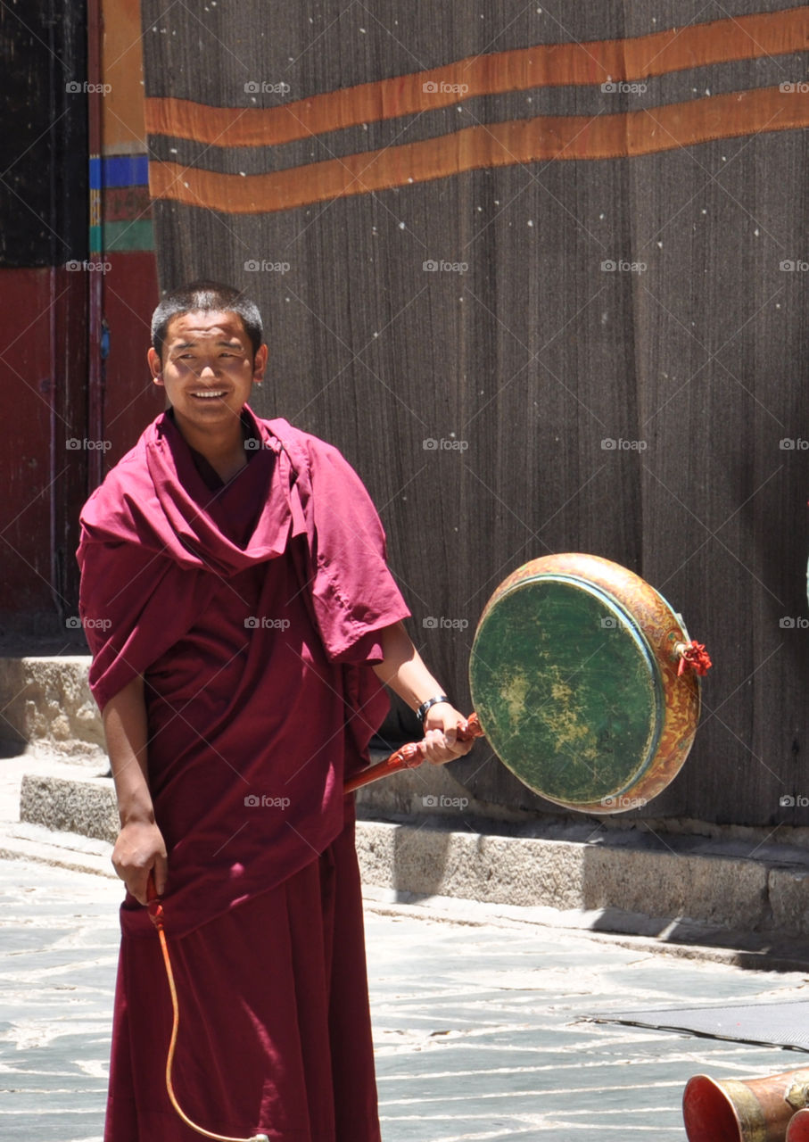 monk with musical instrument