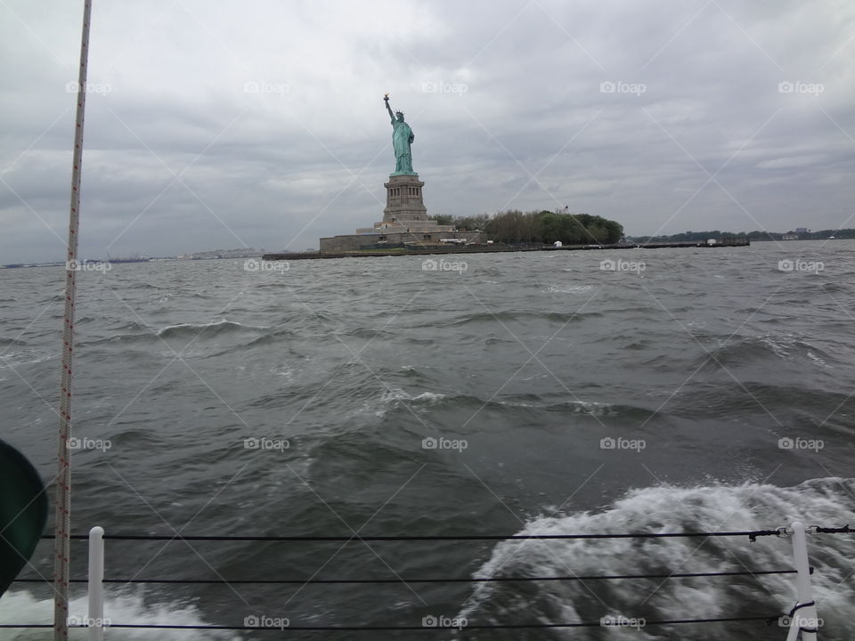 Sailing in NYC. Sailing saying hello to lady liberty