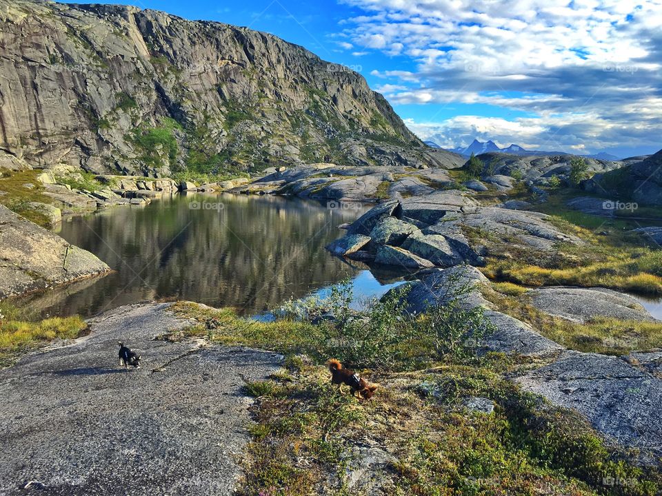 Little lake between the huge mountains - north Norway. 