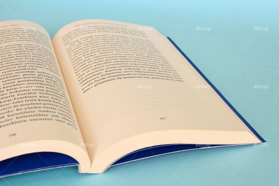 Book isolated on blue