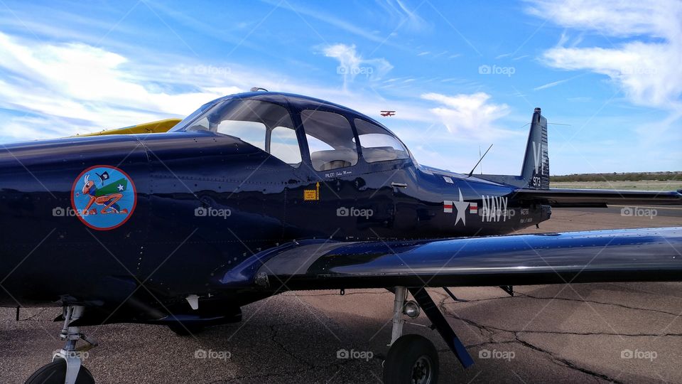 Vintage BeechcraftNavy training plane on display at an Arizona air show.