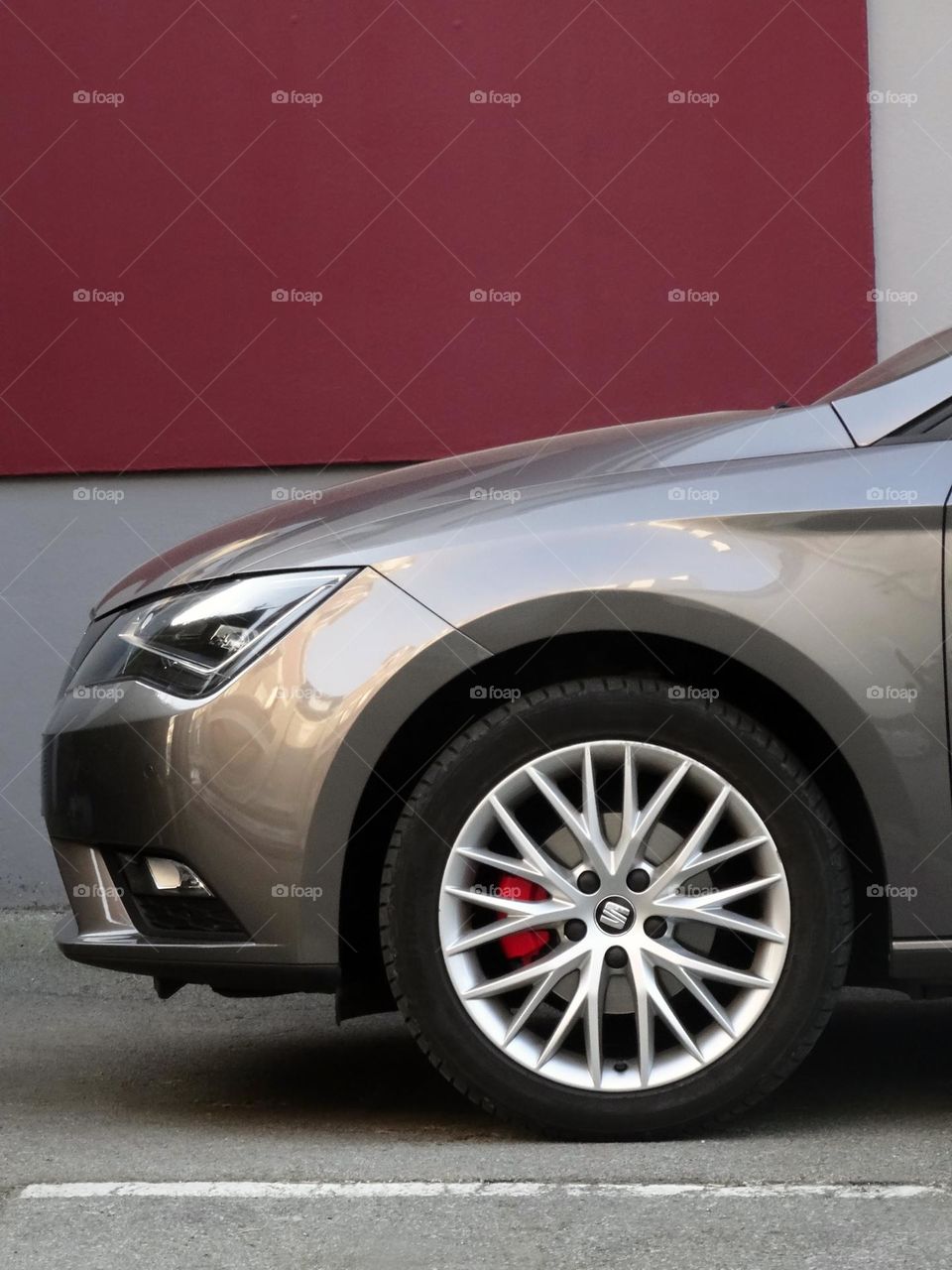 one nice Seat Leon against colored designed wall