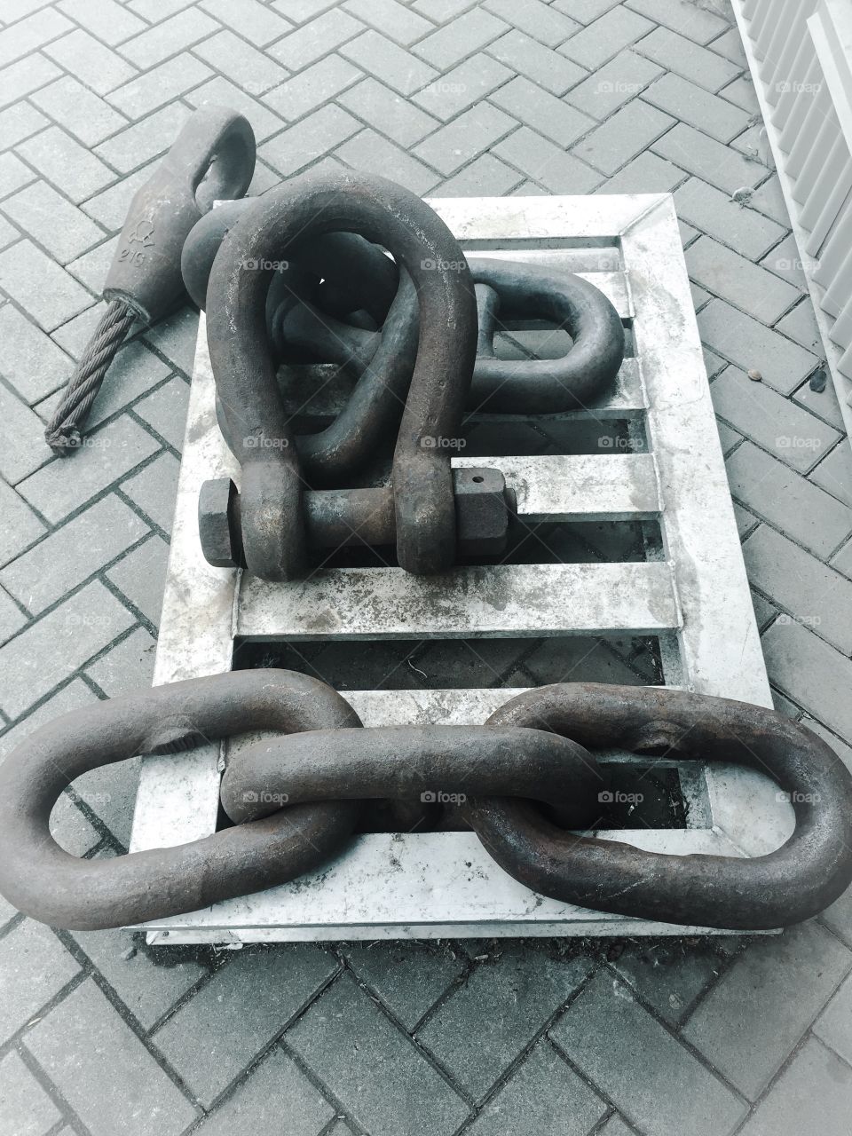 Black and white image of anchors outside the north shore shipyards in British Columbia 