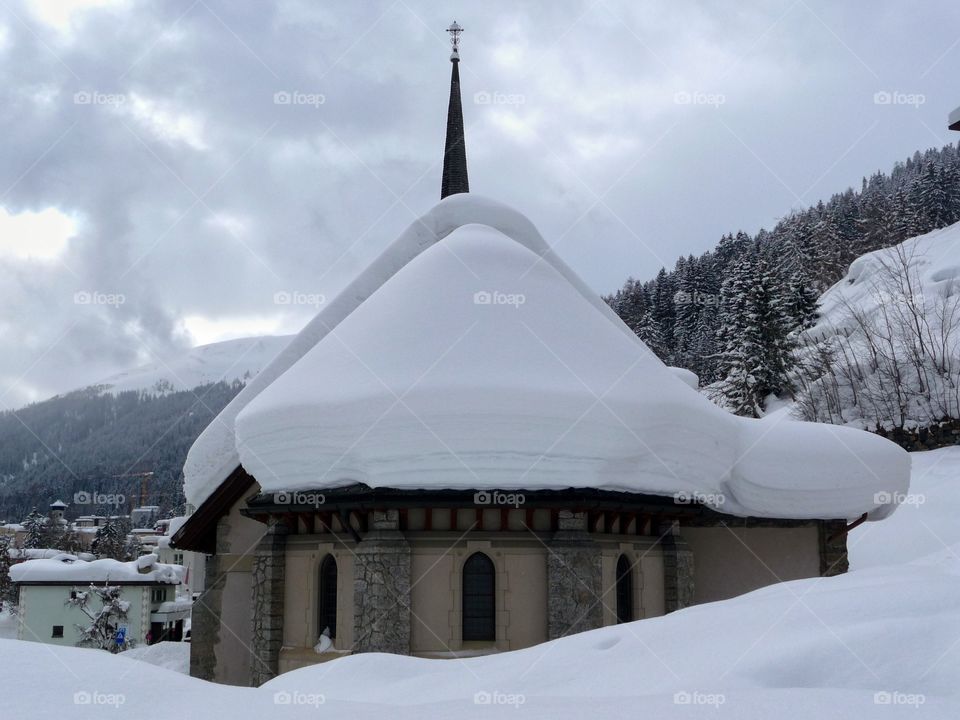 Frozen church roof in winter