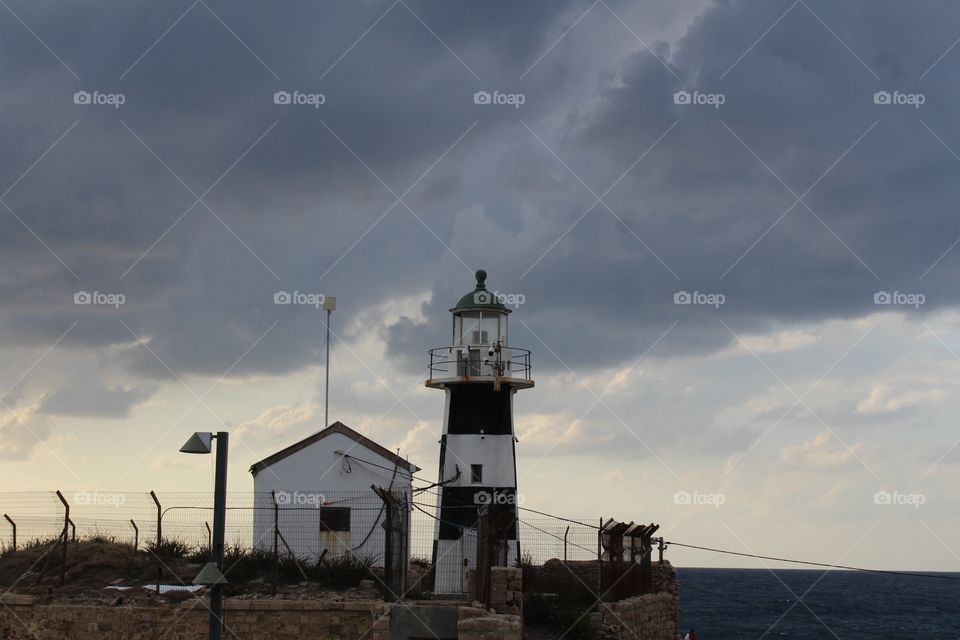 Clouds above a lighthouse