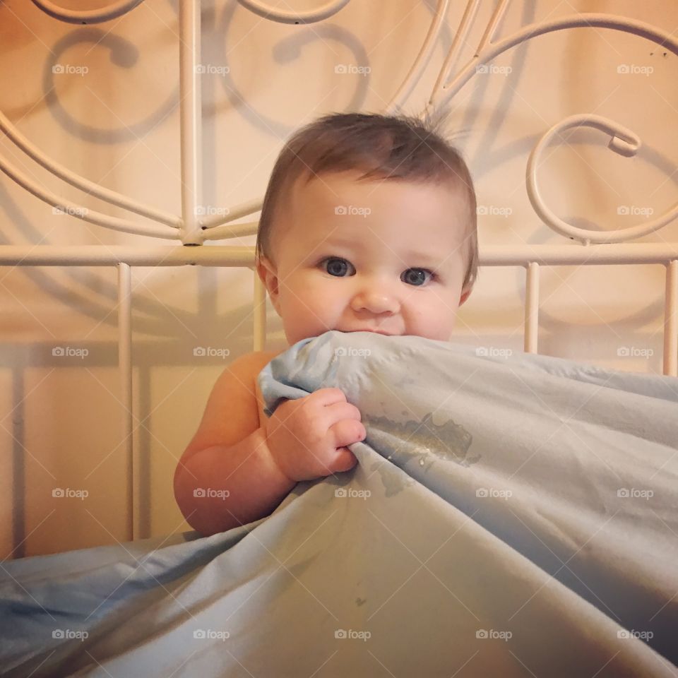 Baby Stealing the Sheets 